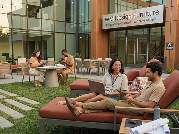 Employees working on laptops and tablets in a modern corporate outdoor patio featuring custom-made lounge chairs by WM Design Furniture in Van Nuys.